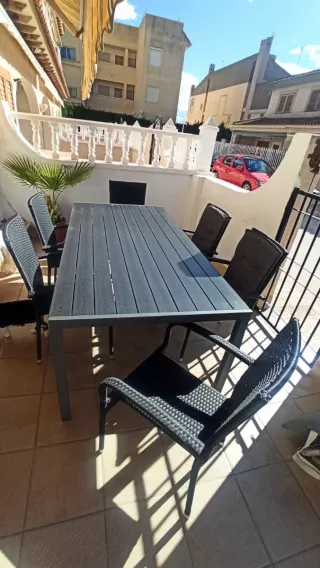 Mesa de jardín y 6 sillas