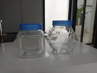 2 tarros de cristal con tapa azul, alto 16 y 18ctm