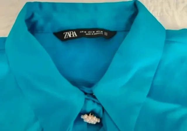 Camisa satinada azul Zara