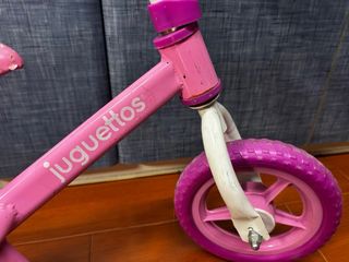 Bici sin pedales rosa con caballito de mar