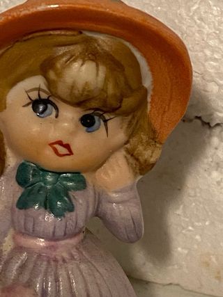 Tre statuine in porcellana