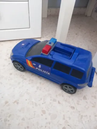 Coche de policía azul de juguete