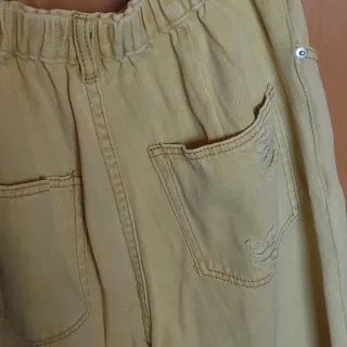 Pantalón vaquero mujer amarillo roto