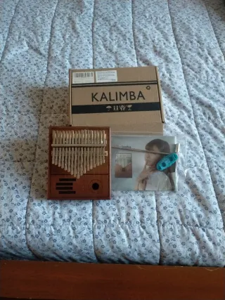Kalimba in legno con scatola e accessori