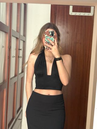 Top multiposición negro talla XS