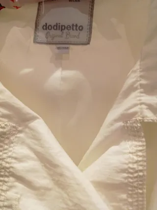 Gabardina niña Dodipetto blanca