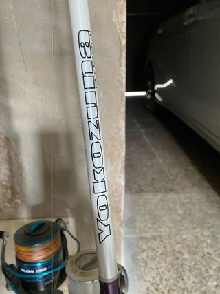 3 cañas de pesca con carretes