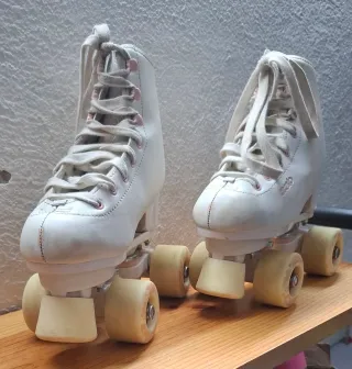 Patines de artístico. Niña. Marca Oxelo talla 33.