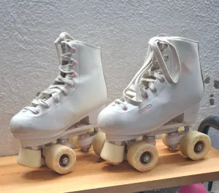 Patines de artístico. Niña. Marca Oxelo talla 33.