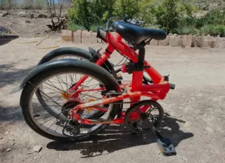 Bicicleta plegable naranja fluor Btwin