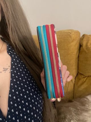 Cartera doble cremallera diseño