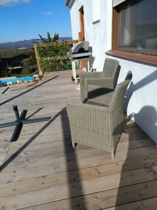 Sillónes de mimbre gris para exterior