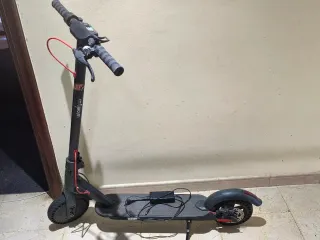 Patinete eléctrico y cargador No envio