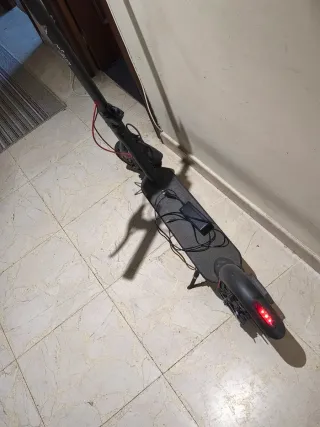 Patinete eléctrico y cargador No envio