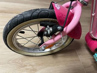 Bicicleta infantil BTWIN 14” rosa con ruedines