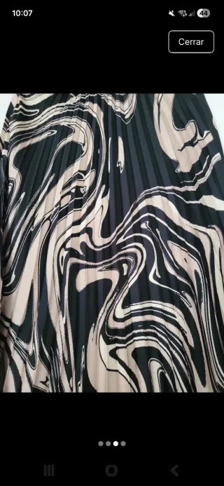 Falda plisada estampada beige y negra