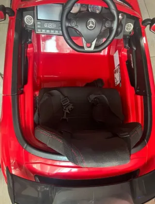 Coche eléctrico infantil rojo