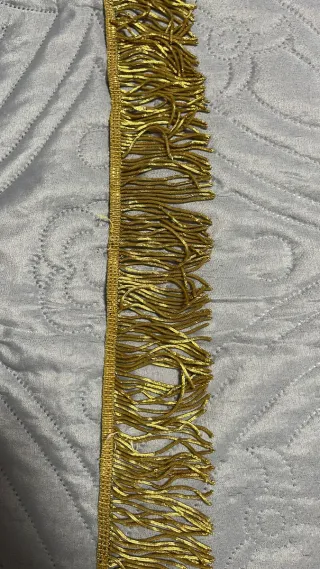 Fleco metálico dorado 53cm