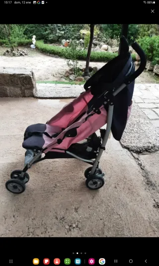 Silla de paseo rosa y negra