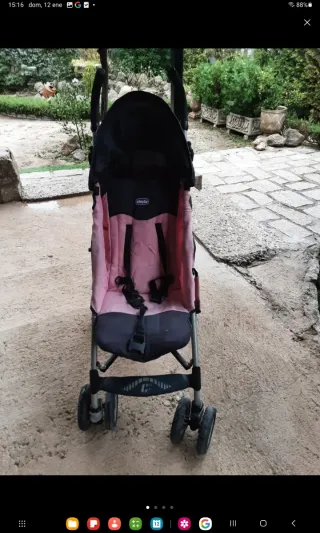 Silla de paseo rosa y negra