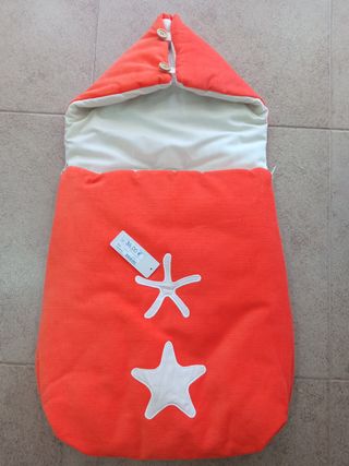 Saco capazo bebé naranja estrellas