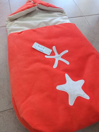 Saco capazo bebé naranja estrellas
