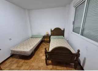 Dormitorio madera clásico