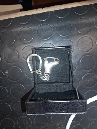 Llavero patín plata