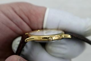 Seiko Quartz clásico dorado esfera blanca