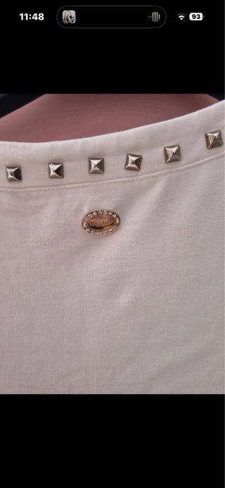 Felpa bianca con borchie