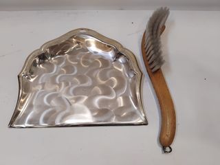 Recogemigas de metal plateado