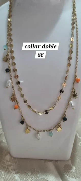 Collar doble dorado con charms