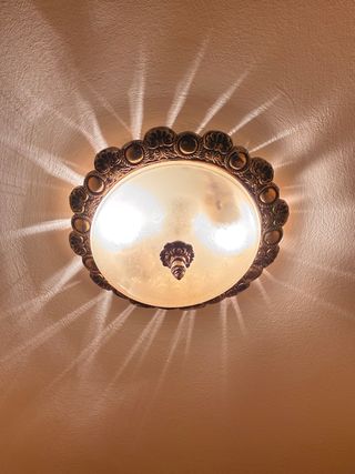 Lámpara de techo cristal y metal dorada