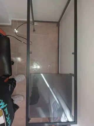 Mesa de cristal y metal negra