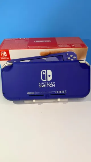 Nintendo Switch Lite Azul con Caja y accesorios.