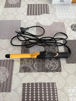 Rizador de pelo amarillo y negro