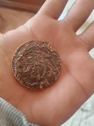 Moneda antigua de bronce