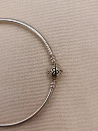 Pulsera plata con charm