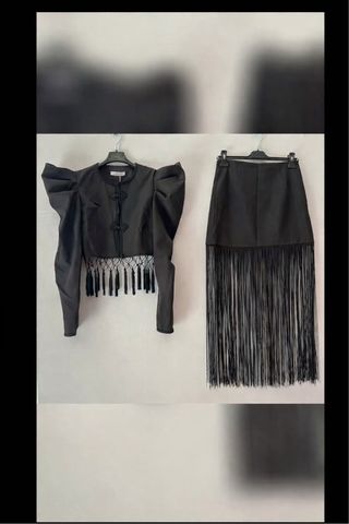 Conjunto chaqueta y falda flecos