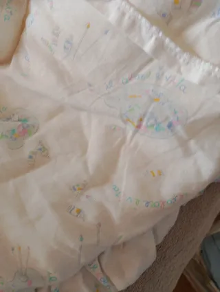 Protezione per culla con paracolpi