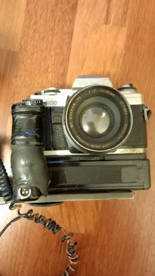Cámara Minolta X300 con flash Metz