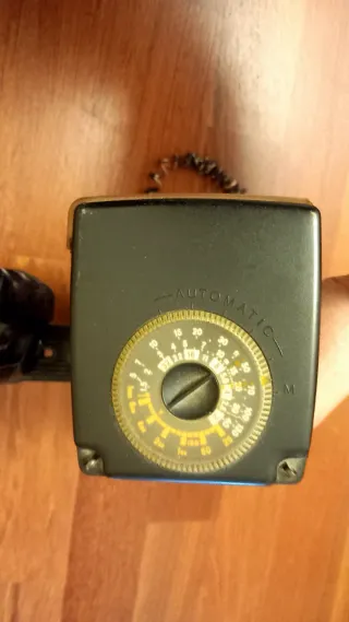 Cámara Minolta X300 con flash Metz