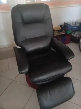 Sillón reclinable de cuero negro