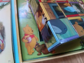 Winnie the Pooh. Libro de cartón con cubos-puzl...