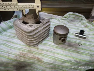 Cilindro 65 cc su pistón y la culata de 49.