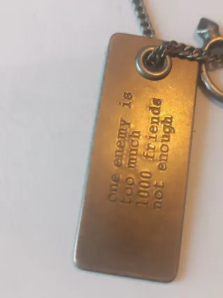 Collana uomo con ciondolo inciso