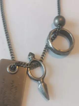 Collana uomo con ciondolo inciso