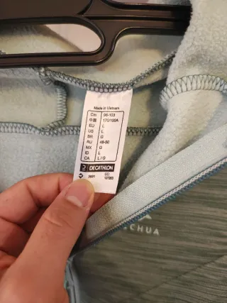 Forro polar Quechua con capucha y cremallera