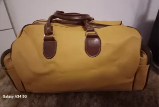 Bolsa de viaje de cuero para estancias cortas