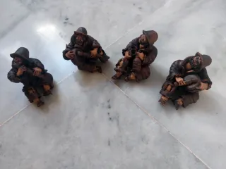 Figuras de barro músicos sentados